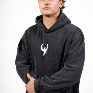 Man wearing Reborn Hoodie in studio